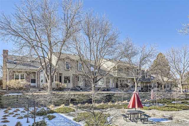 view of snow covered property