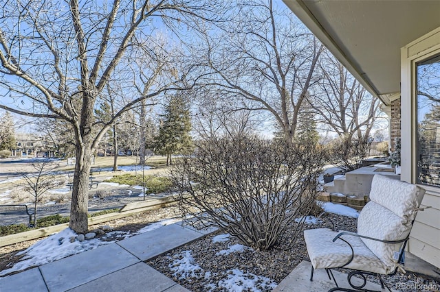 view of snow covered patio