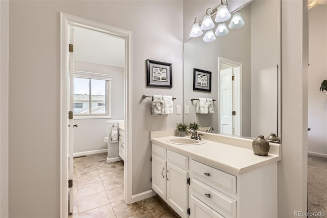 bathroom with vanity and tile patterned floors