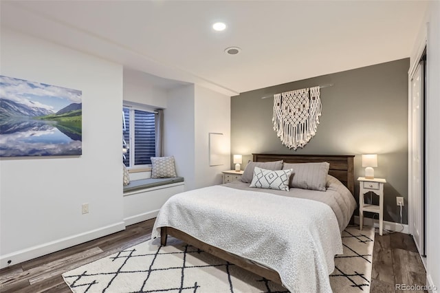 bedroom featuring hardwood / wood-style flooring