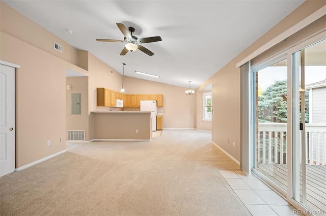 11640 W 62nd Pl Unit 203, Arvada, CO 80004 - unfurnished living room with a ceiling fan, electric panel, vaulted ceiling, a chandelier, and light colored carpet