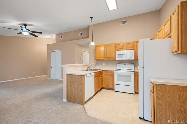 11640 W 62nd Pl Unit 203, Arvada, CO 80004 - kitchen with white appliances, a peninsula, ceiling fan, light countertops, and a towering ceiling