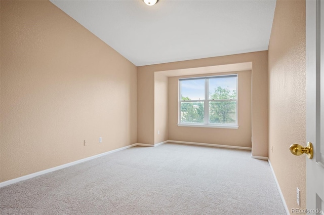11640 W 62nd Pl Unit 203, Arvada, CO 80004 - carpeted spare room with lofted ceiling and a textured wall