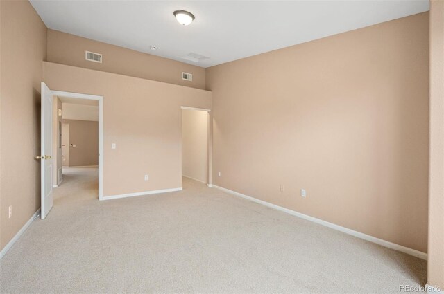 11640 W 62nd Pl Unit 203, Arvada, CO 80004 - unfurnished bedroom featuring light carpet and baseboards