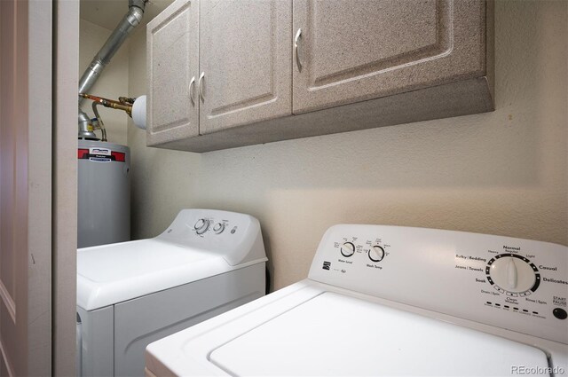 11640 W 62nd Pl Unit 203, Arvada, CO 80004 - laundry room with water heater, independent washer and dryer, and cabinet space