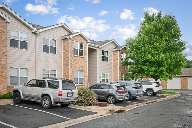11640 W 62nd Pl Unit 203, Arvada, CO 80004 - view of uncovered parking lot