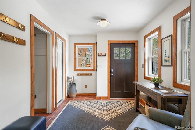 entryway featuring light tile patterned floors