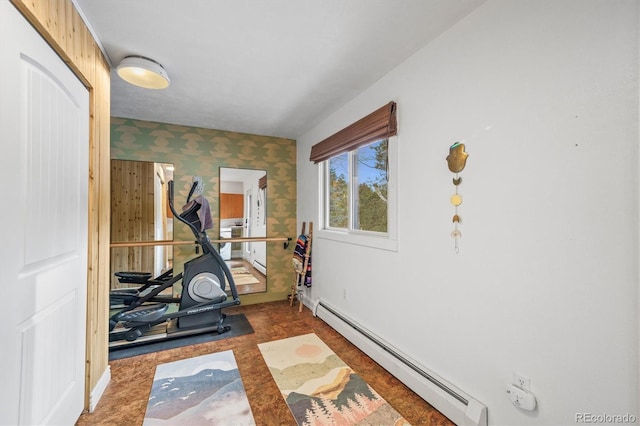 workout room with baseboard heating