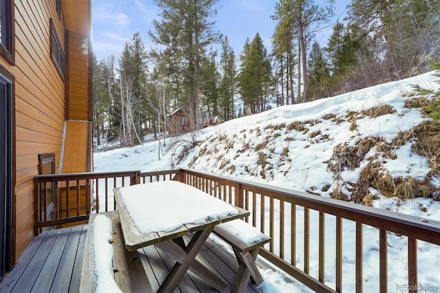 view of snow covered deck