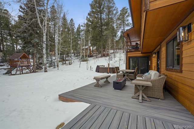 view of snow covered deck