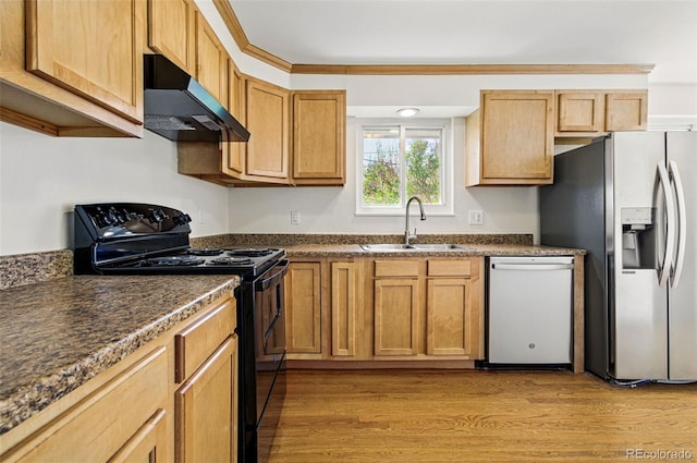 7065 Ingalls Ct, Arvada, CO 80003 - kitchen featuring stainless steel appliances, a sink, exhaust hood, and dark countertops