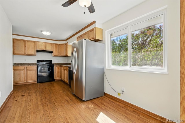 7065 Ingalls Ct, Arvada, CO 80003 - kitchen featuring black range with electric stovetop, stainless steel fridge with ice dispenser, under cabinet range hood, dark wood-type flooring, and dark countertops