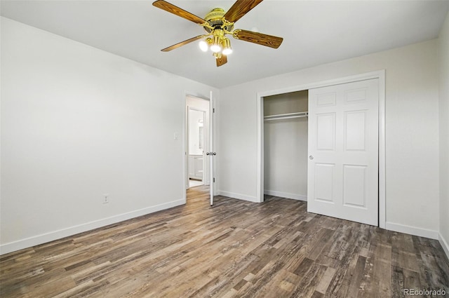7065 Ingalls Ct, Arvada, CO 80003 - unfurnished bedroom with wood finished floors, baseboards, a closet, and ceiling fan