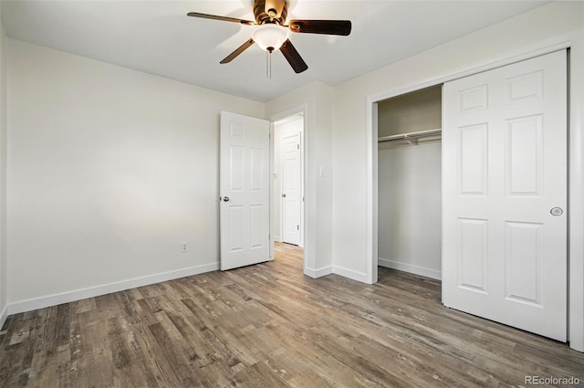 7065 Ingalls Ct, Arvada, CO 80003 - unfurnished bedroom with wood finished floors, baseboards, a closet, and ceiling fan