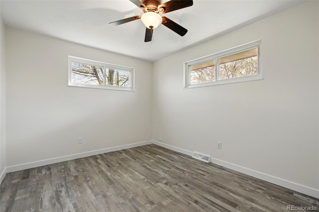7065 Ingalls Ct, Arvada, CO 80003 - unfurnished room featuring wood finished floors, baseboards, and ceiling fan