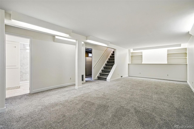 7065 Ingalls Ct, Arvada, CO 80003 - finished below grade area with carpet floors, stairway, and baseboards
