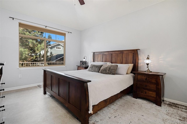 bedroom with lofted ceiling and ceiling fan