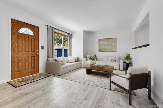1759 Cedar St, Broomfield, CO 80020 - living area with light wood-style floors and baseboards