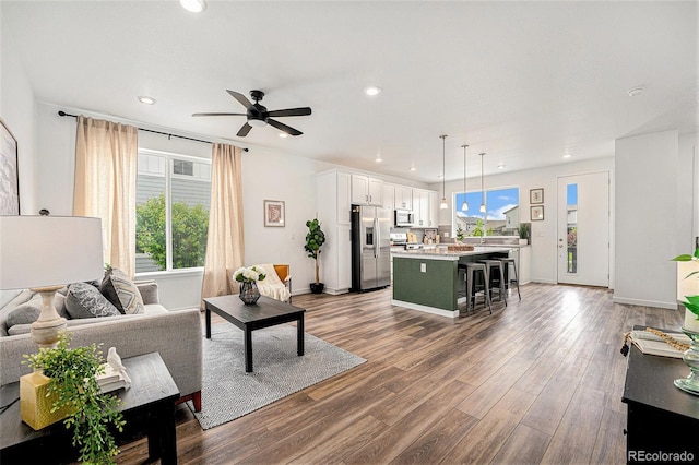 2054 S Upham Way, Denver, CO 80227 - living area featuring recessed lighting, wood finished floors, and ceiling fan