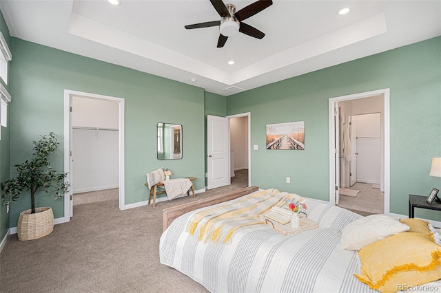 2054 S Upham Way, Denver, CO 80227 - bedroom with a raised ceiling, recessed lighting, a spacious closet, a closet, and ceiling fan