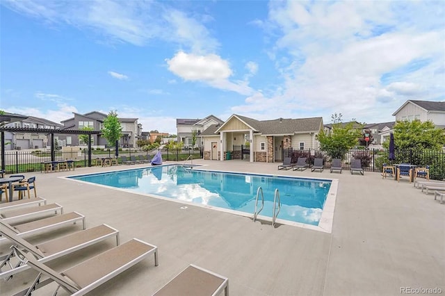 2054 S Upham Way, Denver, CO 80227 - community pool with a patio area and a residential view