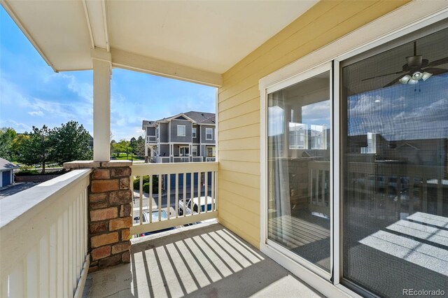 9434 Ashbury Cir Unit 203, Parker, CO 80134 - balcony featuring ceiling fan