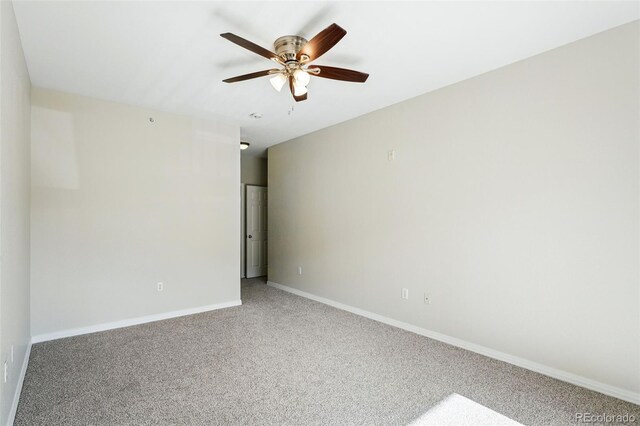 9434 Ashbury Cir Unit 203, Parker, CO 80134 - carpeted spare room featuring ceiling fan and baseboards