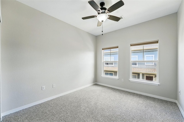 9434 Ashbury Cir Unit 203, Parker, CO 80134 - carpeted spare room with baseboards and ceiling fan
