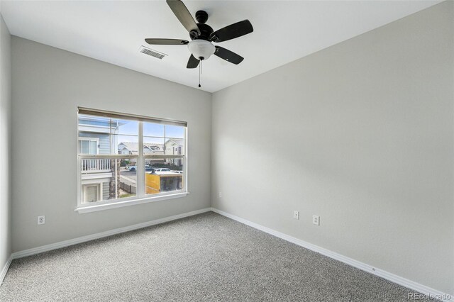 9434 Ashbury Cir Unit 203, Parker, CO 80134 - empty room featuring carpet, baseboards, and ceiling fan