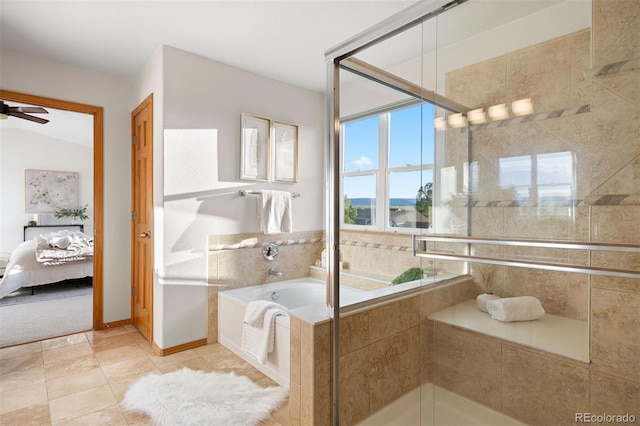 full bath featuring connected bathroom, a bath, a tile shower, and tile patterned flooring