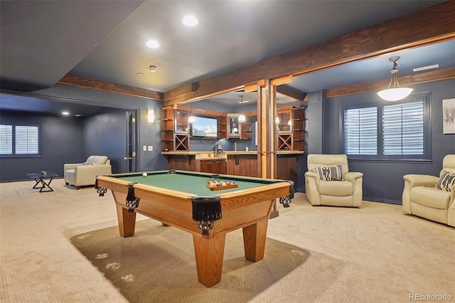 game room featuring beamed ceiling, pool table, plenty of natural light, and carpet