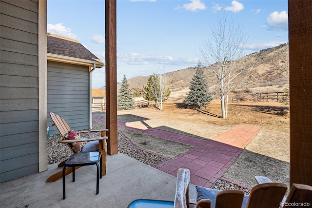 view of patio with a mountain view