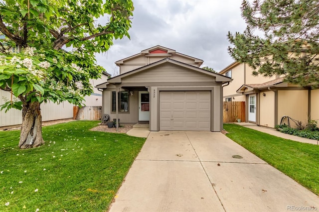 9328 Fenton Ct, Westminster, CO 80031 - view of front of house with driveway and a garage