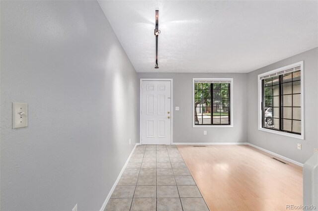 9328 Fenton Ct, Westminster, CO 80031 - foyer entrance featuring baseboards and light tile patterned flooring