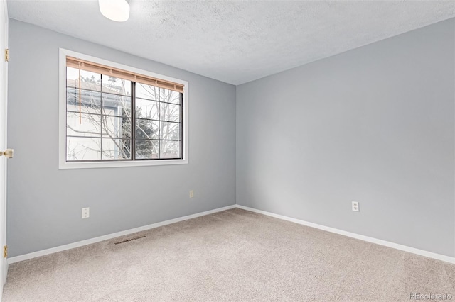 9328 Fenton Ct, Westminster, CO 80031 - carpeted empty room featuring a textured ceiling and baseboards