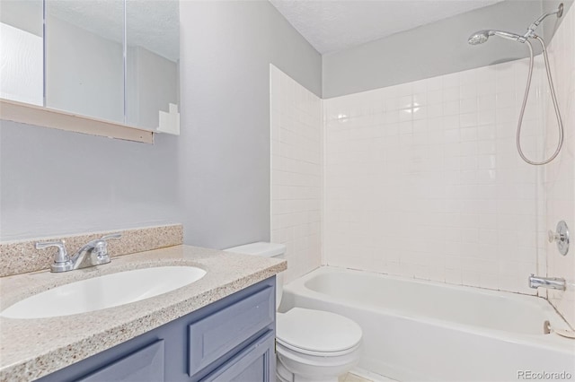 9328 Fenton Ct, Westminster, CO 80031 - bathroom featuring bathtub / shower combination, vanity, and a textured ceiling
