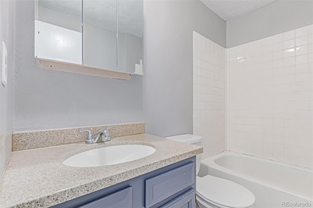 9328 Fenton Ct, Westminster, CO 80031 - full bathroom with vanity, a textured ceiling, and shower / bath combination