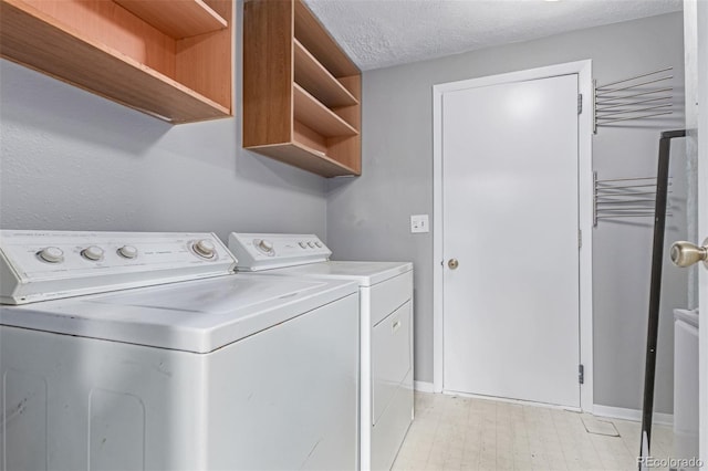 9328 Fenton Ct, Westminster, CO 80031 - laundry area featuring washing machine and clothes dryer, light flooring, and a textured ceiling