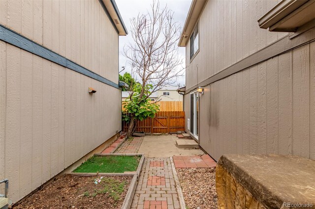 9328 Fenton Ct, Westminster, CO 80031 - view of home's exterior with a patio area