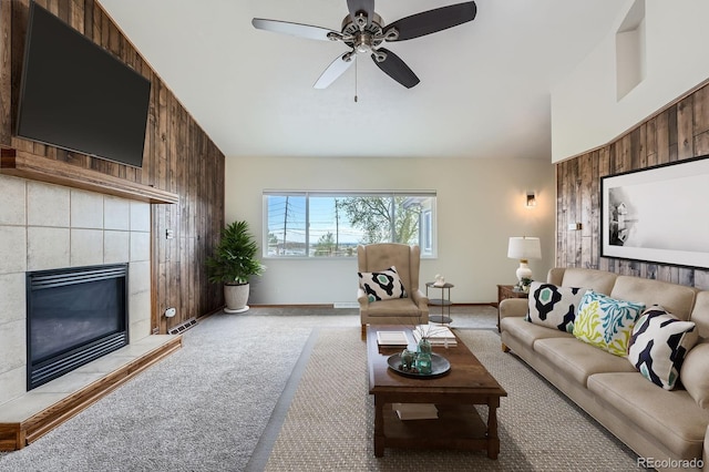 13805 W 82nd Ave, Arvada, CO 80005 - carpeted living area with baseboards, ceiling fan, lofted ceiling, and a fireplace