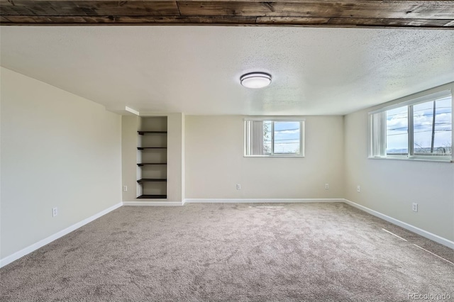 13805 W 82nd Ave, Arvada, CO 80005 - interior space with built in features, baseboards, carpet, and a textured ceiling