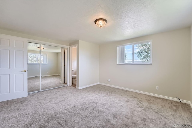 13805 W 82nd Ave, Arvada, CO 80005 - unfurnished bedroom featuring baseboards, carpet, and a closet