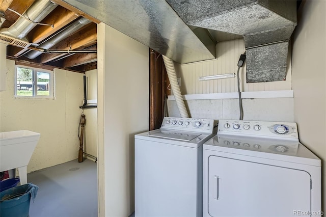 13805 W 82nd Ave, Arvada, CO 80005 - laundry room with laundry area and washing machine and clothes dryer