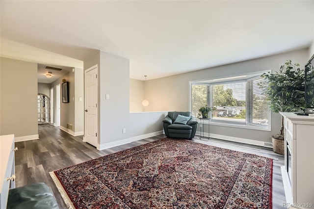 1477 S Wright St, Lakewood, CO 80228 - sitting room with wood finished floors and baseboards