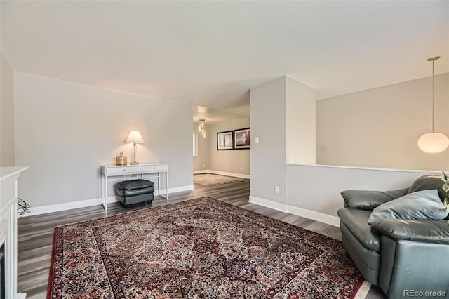 1477 S Wright St, Lakewood, CO 80228 - living area featuring wood finished floors and baseboards