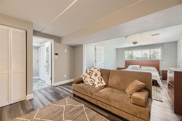 1477 S Wright St, Lakewood, CO 80228 - living area with wood finished floors and baseboards