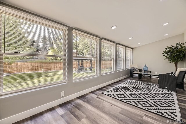 1477 S Wright St, Lakewood, CO 80228 - sunroom / solarium featuring wood finished floors, baseboards, and recessed lighting