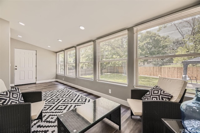 1477 S Wright St, Lakewood, CO 80228 - sunroom with baseboards, wood finished floors, lofted ceiling, and recessed lighting