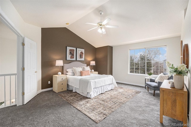 bedroom featuring lofted ceiling, baseboards, a ceiling fan, and carpet flooring