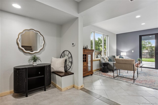 entryway featuring light tile patterned floors